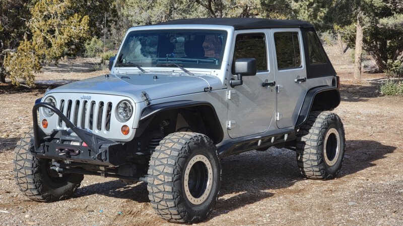 JKU parked in trees