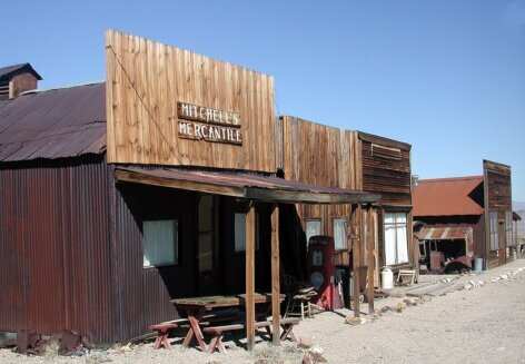 Historic wood-frame buildings along the main street of Gold Point, Nevada